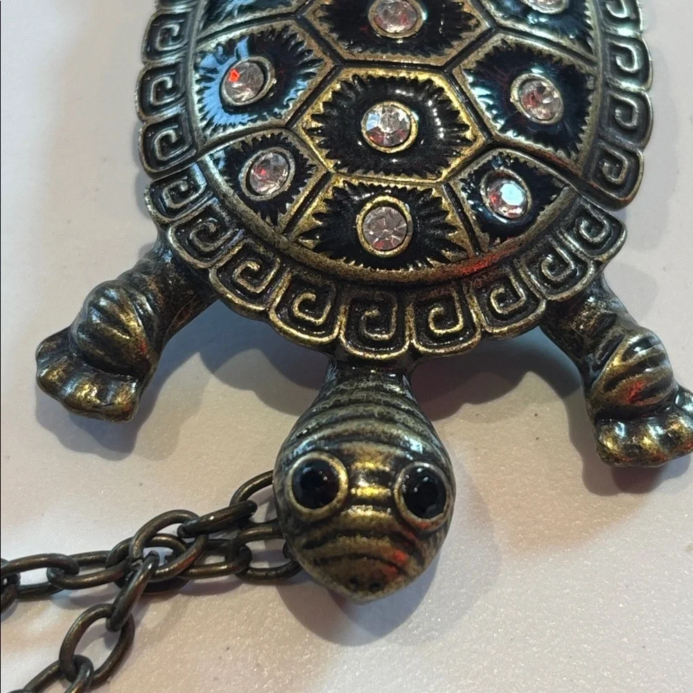 TURTLE NECKLACE EMBELLISHED WITH RHINESTONES LOOKS LIKE BRASS NO MARKINGS